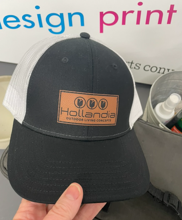 Custom Hollandia branded hat produced by Holland Michigan print shop