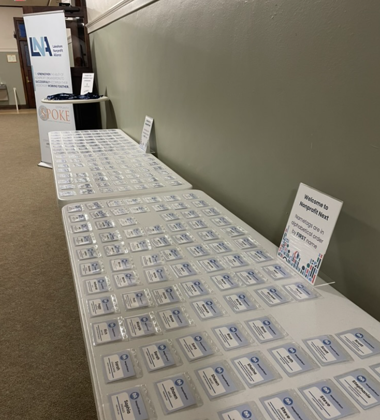 Custom name badges for nonprofit event produced by Schreur Printing in Holland MI