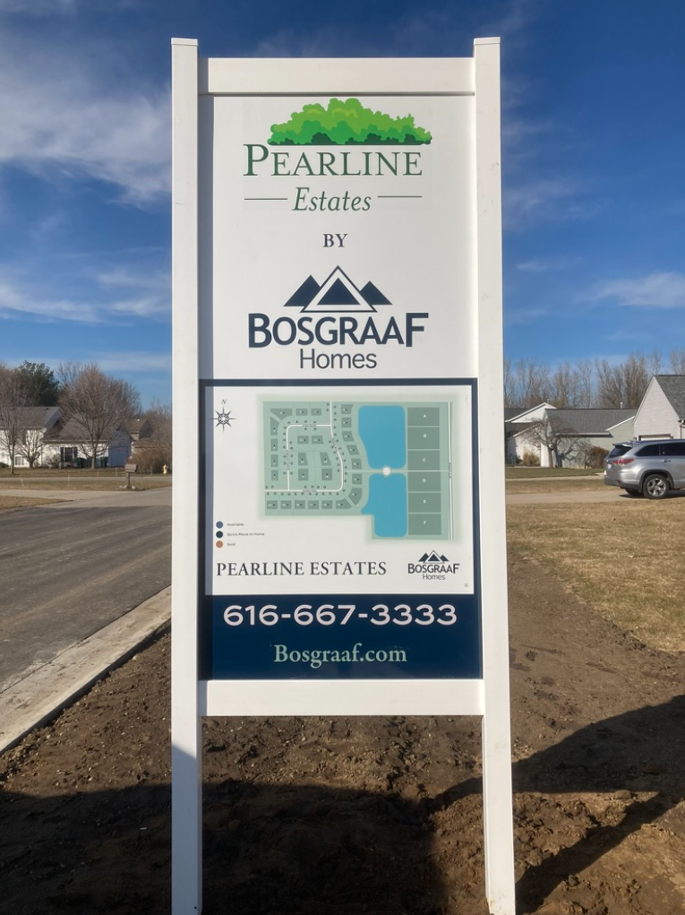 Custom business sign for Pearline Estates produced by Holland MI print shop