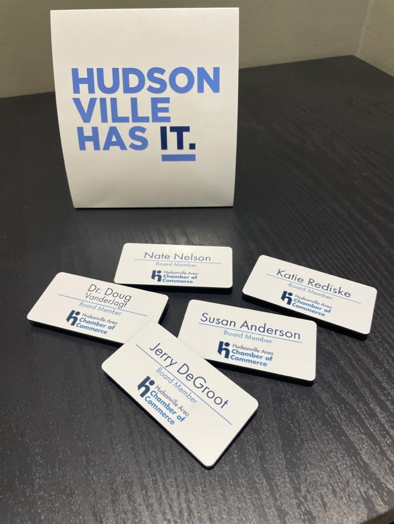 Custom name tags produced by Holland MI print shop offering promotional products and graphic design services